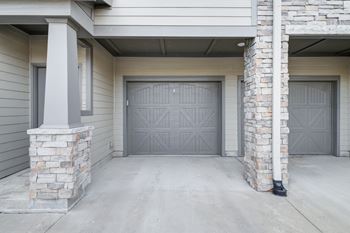 Two car garage with decorative barn style doors